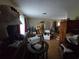 Spacious living room featuring hardwood floors and natural light, perfect for comfortable living at 4343 Arrow Ave, Sarasota, FL 34232