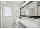Clean bathroom features a vanity with a granite countertop, modern fixtures, and plenty of space at 4344 Bent Tree Blvd, Sarasota, FL 34241