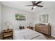 Cozy bedroom with neutral tones, comfortable bed, and ample natural light at 4344 Bent Tree Blvd, Sarasota, FL 34241