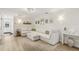 Bright living room featuring a large sectional sofa and modern decor at 4344 Bent Tree Blvd, Sarasota, FL 34241