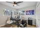 Home office with modern desk, comfortable seating, and ample natural light at 4344 Bent Tree Blvd, Sarasota, FL 34241