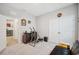 Spacious bedroom featuring carpet, closet, neutral walls and ceiling fan at 4405 Weathered Moss Gln, Palmetto, FL 34221
