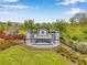 Silverstone community sign with flowers and manicured landscaping at 4405 Weathered Moss Gln, Palmetto, FL 34221