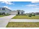 Charming single-story home with a well-manicured lawn and attached two car garage at 4405 Weathered Moss Gln, Palmetto, FL 34221