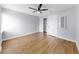 This bedroom offers durable wood floors, ceiling fan and ample closet space at 4455 Emerald Ridge Dr, Sarasota, FL 34233