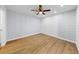 Bright bedroom featuring durable floors, a ceiling fan and neutral wall color scheme for a comfortable space at 4455 Emerald Ridge Dr, Sarasota, FL 34233