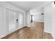 Bright foyer with wood-look floors leads to a spacious and open living area at 4455 Emerald Ridge Dr, Sarasota, FL 34233