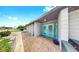 Inviting front entrance features a blue-colored double door and sleek design at 4455 Emerald Ridge Dr, Sarasota, FL 34233