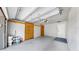 Spacious garage features an automatic door, and concrete block walls, providing ample space for parking and storage at 4455 Emerald Ridge Dr, Sarasota, FL 34233