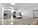 Beautiful kitchen with a granite island, stainless steel appliances, and stylish fixtures at 4455 Emerald Ridge Dr, Sarasota, FL 34233