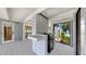 Covered patio featuring a built-in grill and outdoor entertaining space at 4455 Emerald Ridge Dr, Sarasota, FL 34233