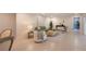 Bright living room with modern furnishings and neutral tile flooring throughout at 483 Partridge Cir, Sarasota, FL 34236