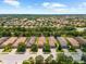 Residential neighborhood with tile roofs and lush greenery at 5121 Serata Dr, Lakewood Ranch, FL 34211