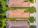 Overhead view of residential properties with tile roofs and screened lanais at 5121 Serata Dr, Lakewood Ranch, FL 34211