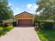 Inviting home featuring a brick driveway and a well-manicured lawn at 5121 Serata Dr, Lakewood Ranch, FL 34211