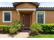Home exterior showcasing brick pathway and manicured landscaping at 5121 Serata Dr, Lakewood Ranch, FL 34211