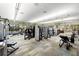 Spacious gym area with carpeted floor, lots of natural light, treadmills, and weight machines at 5121 Serata Dr, Lakewood Ranch, FL 34211