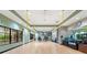Yoga studio with hardwood floors, mirrors, workout equipment and plenty of space to stretch and move at 5121 Serata Dr, Lakewood Ranch, FL 34211