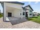 Modern home featuring a convenient porte cochere and stone driveway at 5339 Gulfport Ter, Port Charlotte, FL 33981