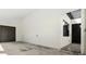 Garage interior with concrete floor and access door to the main house at 5339 Gulfport Ter, Port Charlotte, FL 33981