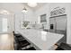 Bright kitchen features a large quartz island, stainless steel appliances and modern fixtures at 5339 Gulfport Ter, Port Charlotte, FL 33981