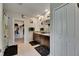 Bathroom featuring double vanity sinks, a walk-in closet, and neutral décor at 5521 Olano St, Palmetto, FL 34221