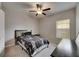 Bedroom featuring a ceiling fan and a large window, providing ample natural light at 5521 Olano St, Palmetto, FL 34221