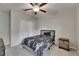 Cozy bedroom with ceiling fan, large window, and closet space at 5521 Olano St, Palmetto, FL 34221