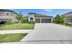 Charming single-story home with a well-manicured lawn and a two-car garage at 5521 Olano St, Palmetto, FL 34221