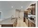 Kitchen with granite countertops, stainless steel appliances, and ample cabinet space at 5521 Olano St, Palmetto, FL 34221