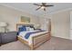 Bedroom with a large window, dresser, and comfortable bed at 5540 Summit Gln, Bradenton, FL 34203