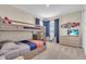 Comfortable bedroom features a bunk bed, dresser, and plenty of natural light for a welcoming and functional space at 5540 Summit Gln, Bradenton, FL 34203
