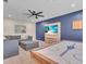 Entertain in this comfortable living room with a large TV and air hockey table, perfect for Gathering fun at 5540 Summit Gln, Bradenton, FL 34203