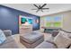 Relax in this living room offering a billiard table, a comfortable sofa, and a large TV for your enjoyment at 5540 Summit Gln, Bradenton, FL 34203