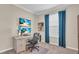 Bright office featuring multiple monitors, a modern desk, and a comfortable rolling chair at 5540 Summit Gln, Bradenton, FL 34203