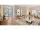 Stylishly furnished living room with hardwood floors, neutral walls, and modern decor, creating a welcoming atmosphere at 5839 Los Verdes Ct, Bradenton, FL 34210