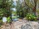 Convenient community boat ramp with easy access to the water, surrounded by lush greenery at 615 Dream Island Pl # 105, Longboat Key, FL 34228