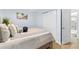 Cozy bedroom with closet and adjoining bath at 6312 Midnight Pass Rd # 102S, Sarasota, FL 34242