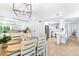 Dining area with view of living room and access to kitchen at 6312 Midnight Pass Rd # 102S, Sarasota, FL 34242