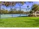 Community tennis courts provide a place to play on a sunny day with well maintained grounds at 7419 Birds Eye Ter, Bradenton, FL 34203