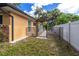 This garden features a paver path, a privacy gate, and plenty of room for growing at 760 Azure Rd, Venice, FL 34293