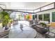 Covered and screened outdoor lanai with plenty of room for dining and lounging at 760 Azure Rd, Venice, FL 34293
