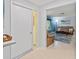 Inviting entryway flowing into a bright living room with comfortable seating and stylish decor at 760 Azure Rd, Venice, FL 34293