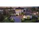 Stunning home with lush landscaping and grand entrance overlooking a tranquil lake at 7665 Haddington Cv, Bradenton, FL 34202