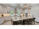 Spacious gourmet kitchen featuring a large center island and stainless steel appliances at 7665 Haddington Cv, Bradenton, FL 34202