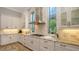 Lovely kitchen with custom cabinetry, granite countertops, and stainless steel appliances at 7665 Haddington Cv, Bradenton, FL 34202