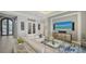 Bright living room featuring stylish decor, a plush sofa, and a large TV, perfect for relaxing and entertaining guests at 7665 Haddington Cv, Bradenton, FL 34202