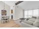 Inviting living room featuring high ceilings and an open layout, complete with modern furnishings and ample natural light at 800 S Blvd Of The Presidents # 16, Sarasota, FL 34236