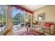 Inviting lanai with pool view, features comfortable seating and access to outdoor entertainment at 8183 Nice Way, Sarasota, FL 34238