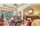 Elegant living room with ornate furniture and decor, showcasing a comfortable and luxurious space at 8183 Nice Way, Sarasota, FL 34238